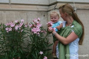 ring sling storchenwiege baby dragen op heup